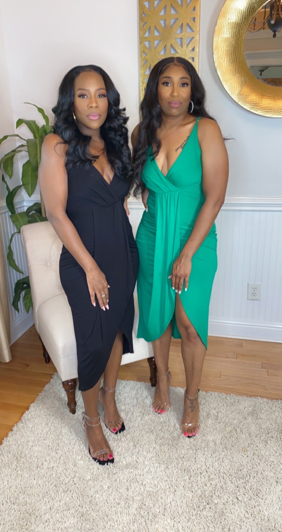 Models are wearing (black) small.  (Green) large